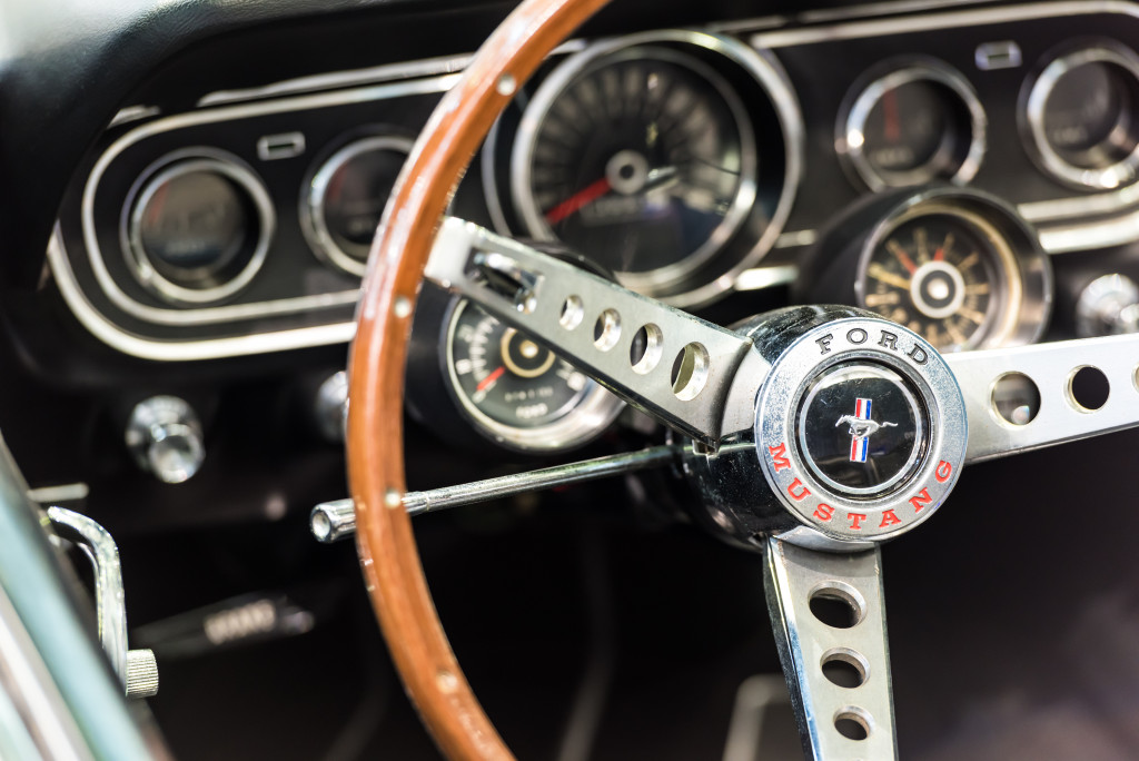 A steering wheel of a Ford Mustang